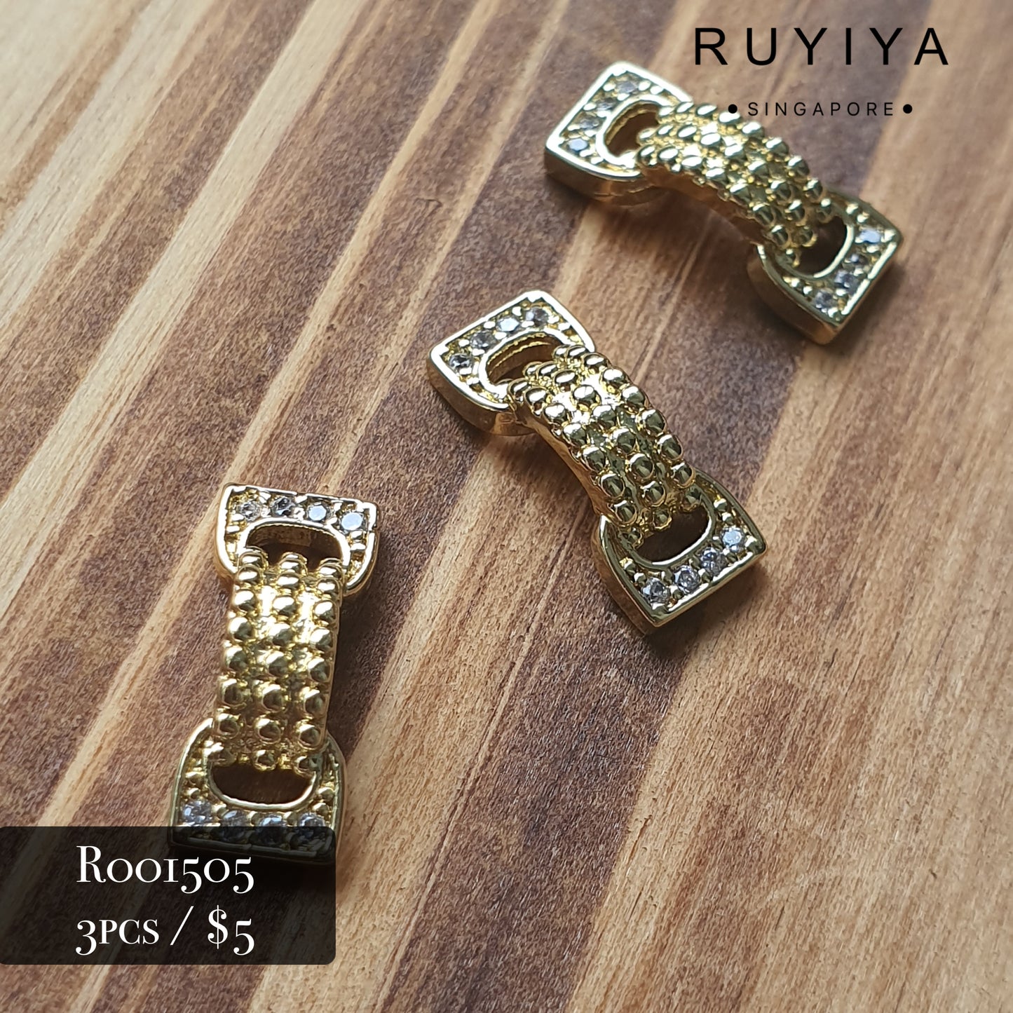 GOLD BOW CRYSTAL CHARM R001505