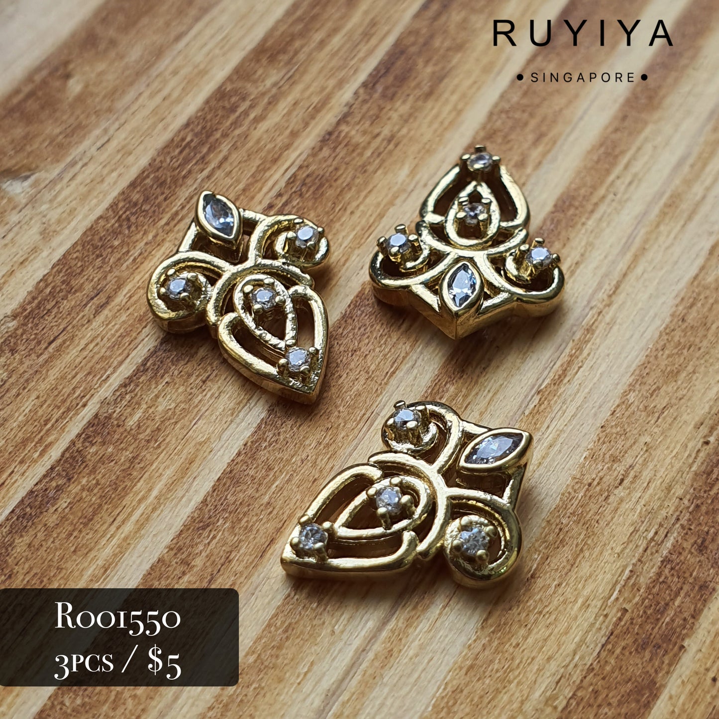 GOLD AEGIS CRYSTAL CHARM R001550