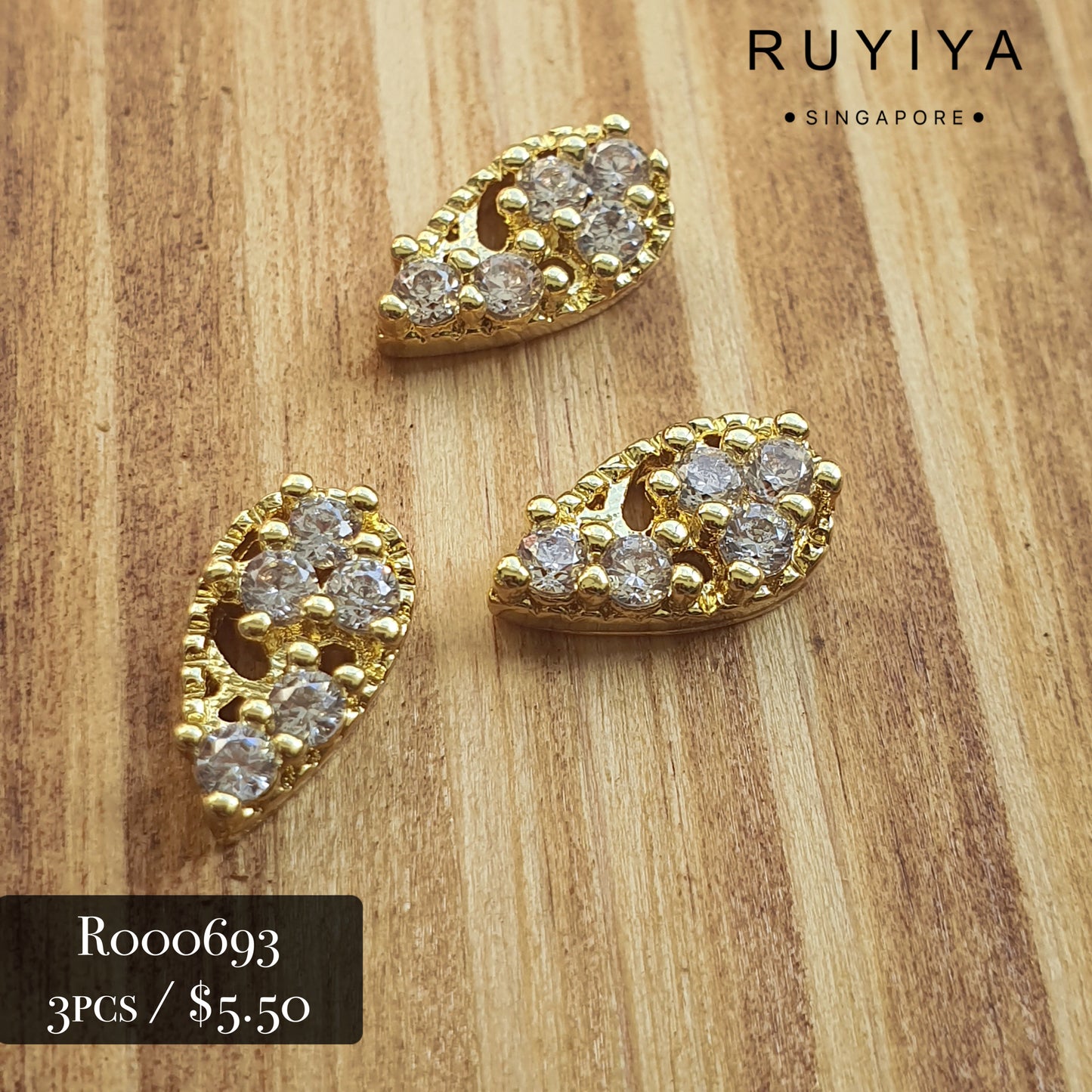 GOLD TEARDROP SUSPENDED CRYSTAL CHARM R000693