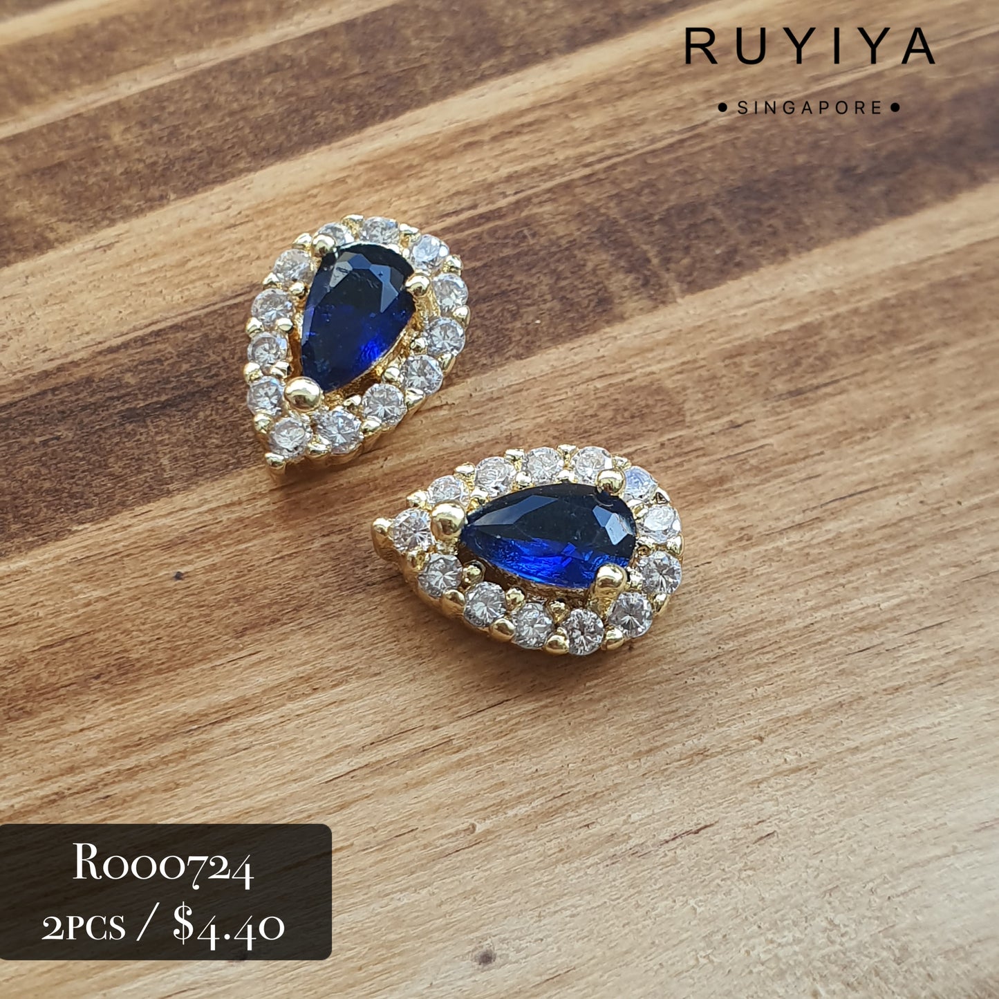 GOLD SMALL TEAR DROP CRYSTAL CHARM (BLUE) R000726