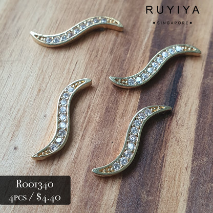 GOLD S-WAVE CRYSTAL CHARM R001340