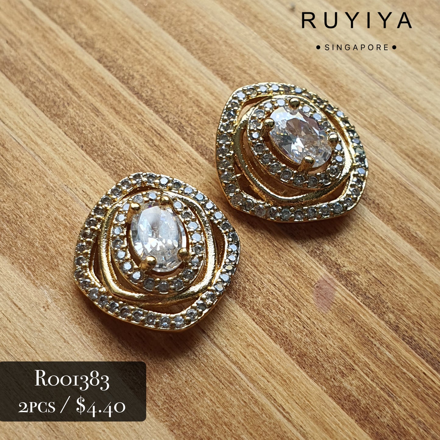 GOLD EYE OF THE STORM CRYSTAL CHARM R001383