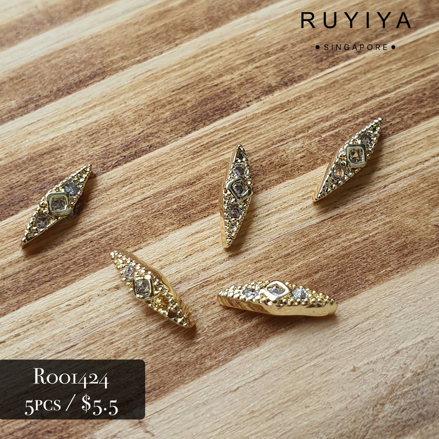 GOLD SMALL ELONGATED DIAMOND CHARM R001424