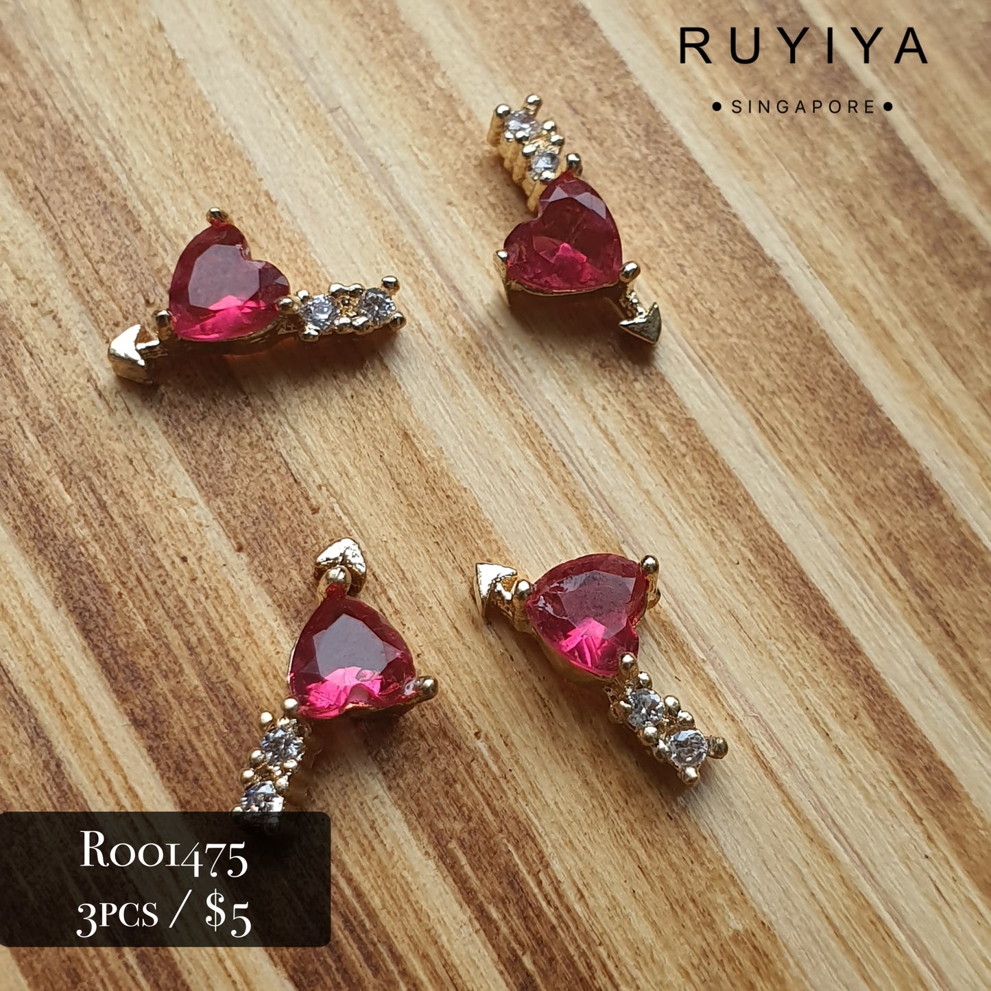 GOLD RUBY ARROWED HEART CRYSTAL CHARM R001475