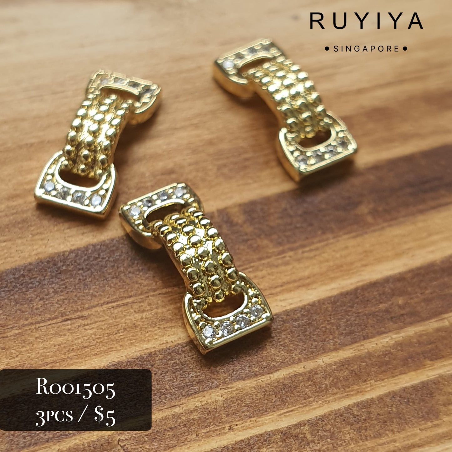 GOLD BOW CRYSTAL CHARM R001505