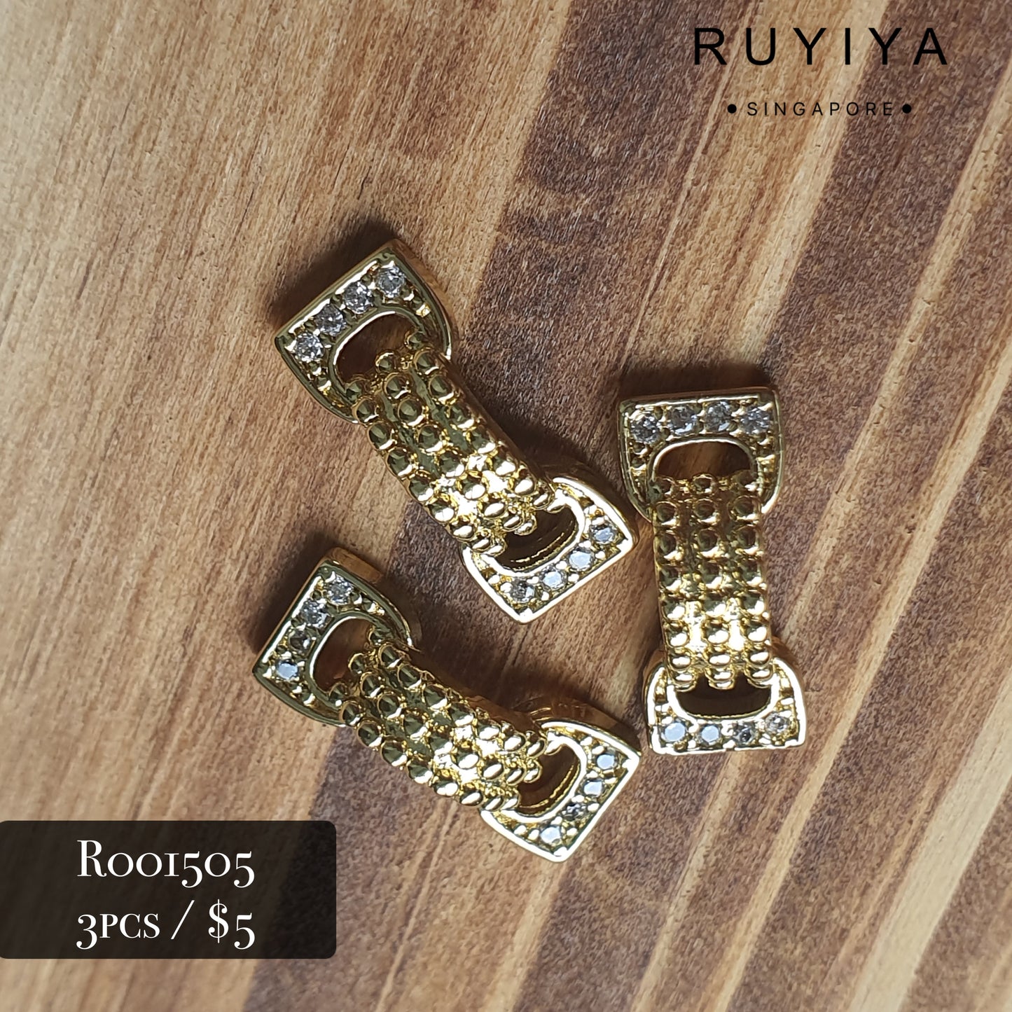 GOLD BOW CRYSTAL CHARM R001505