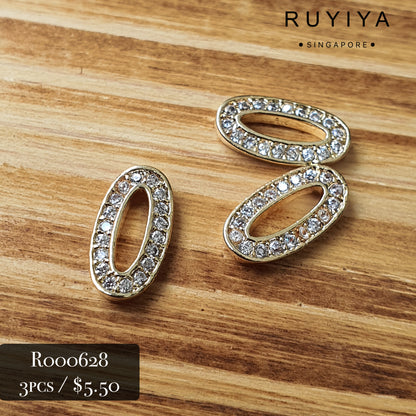 GOLD DUAL FRAME OVAL CHARM R000628