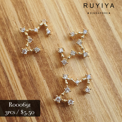 GOLD OPEN STAR CHARM R000691