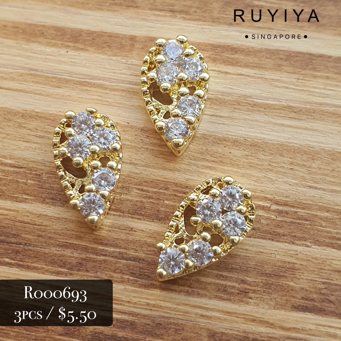 GOLD TEARDROP SUSPENDED CRYSTAL CHARM R000693