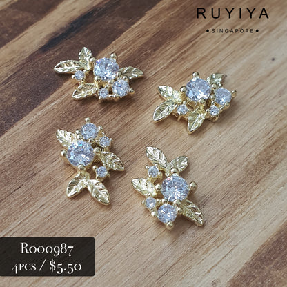 GOLD LEAVES WITH CRYSTAL CHARM R000987