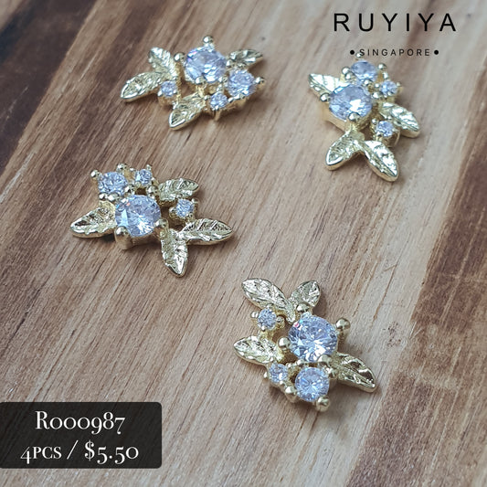 GOLD LEAVES WITH CRYSTAL CHARM R000987