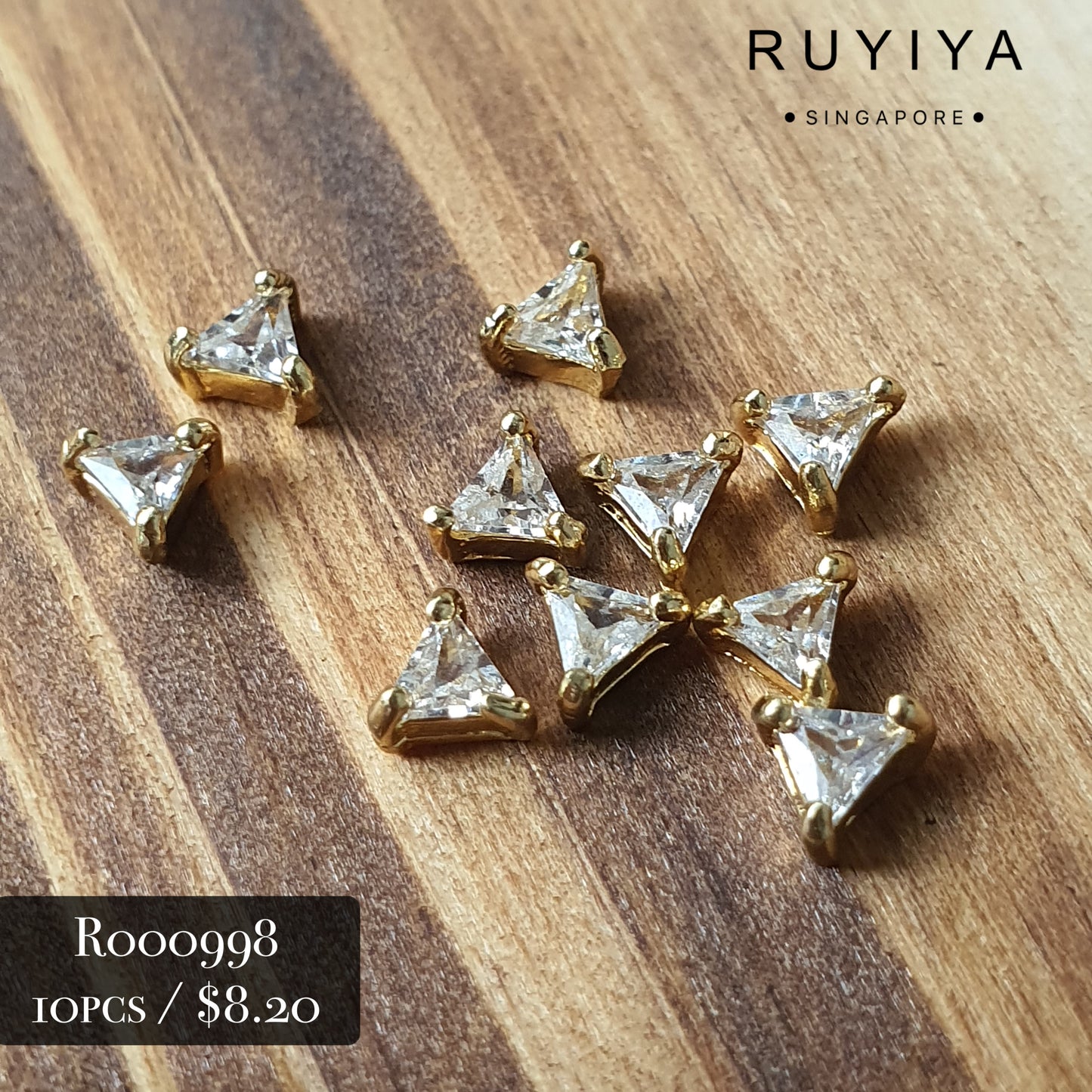 GOLD SMALL TRIANGLE CRYSTAL CHARM R000998