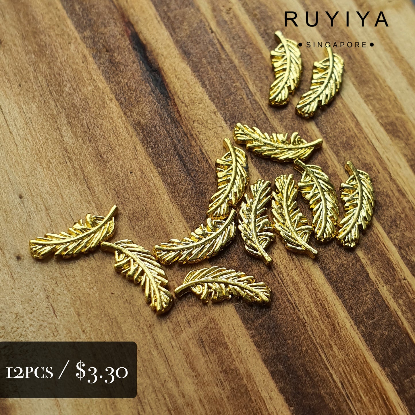 GOLD ANGEL FEATHER CHARM R001652