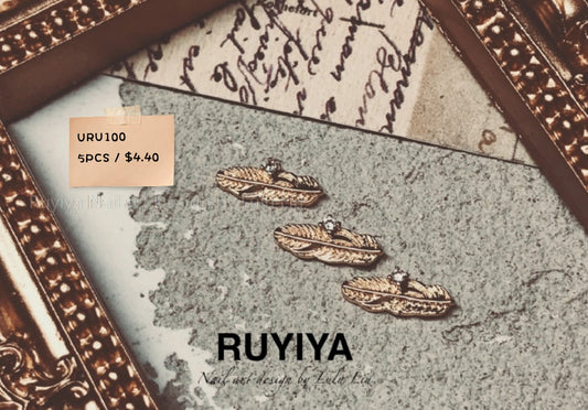 GOLD FEATHER WITH CRYSTAL URU100