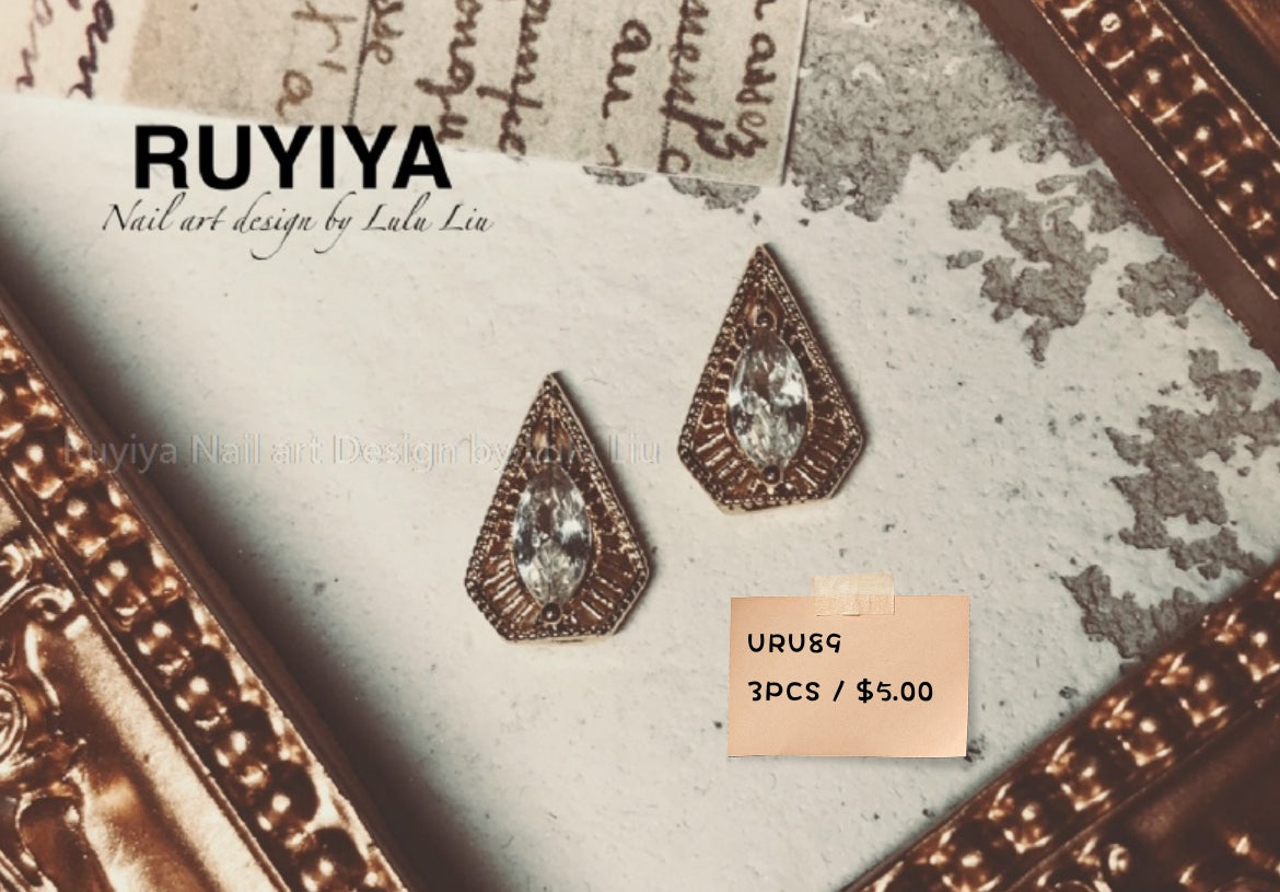 GOLD MARQUISE ZIRCON SHIELD URU89