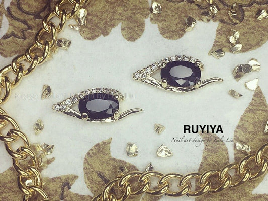 GOLD ONYX OVAL CRYSTAL CHARM URU231