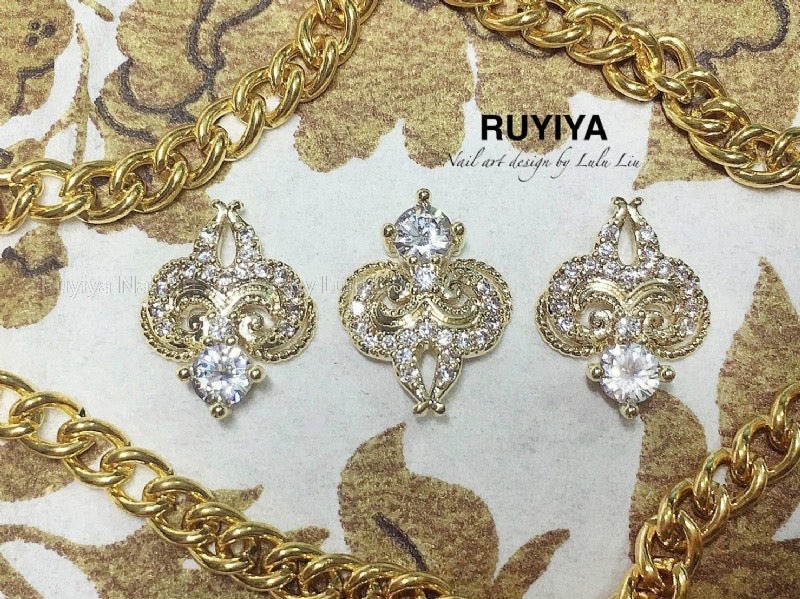 GOLD PLUM BLOSSOM CRYSTAL CHARM URU250