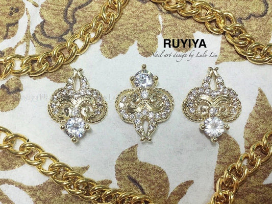 GOLD PLUM BLOSSOM CRYSTAL CHARM URU250